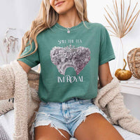 May include a person wearing a Light Green Comfort Colors Spill the Tea I’m Royal T-Shirt featuring regency gossip inspired graphic and relaxed fit.