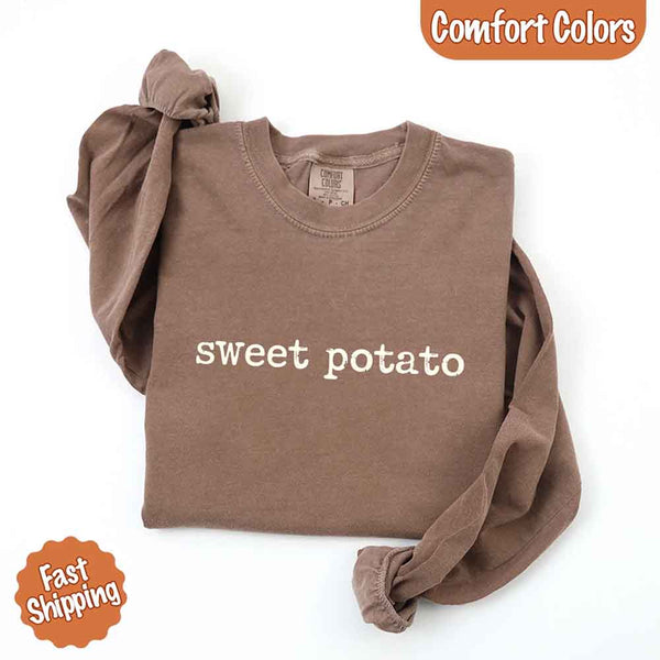 May include a pair of matching fall-themed couple longsleeve shirts from Comfort Colors featuring playful “Sweet Potato” and “Rude Potato” designs. The shirts are styled with humorous graphics or text in warm autumn tones, perfect for couples celebrating the season with a lighthearted touch.