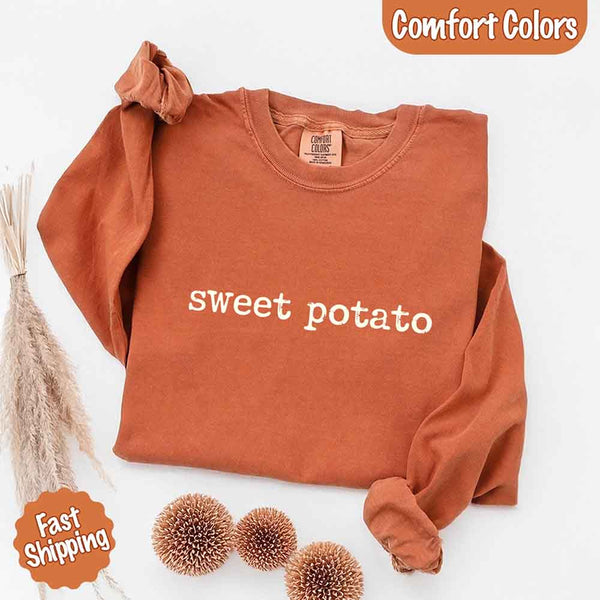 May include a pair of matching fall-themed couple longsleeve shirts from Comfort Colors featuring playful “Sweet Potato” and “Rude Potato” designs. The shirts are styled with humorous graphics or text in warm autumn tones, perfect for couples celebrating the season with a lighthearted touch.