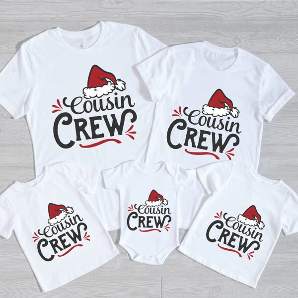 May include a matching family Christmas t-shirt featuring the phrase “Cousin Crew” in festive lettering, often accented with holiday graphics like Santa hats, snowflakes, or Christmas lights. Designed for coordinated family outfits, it conveys a cheerful and playful holiday spirit.