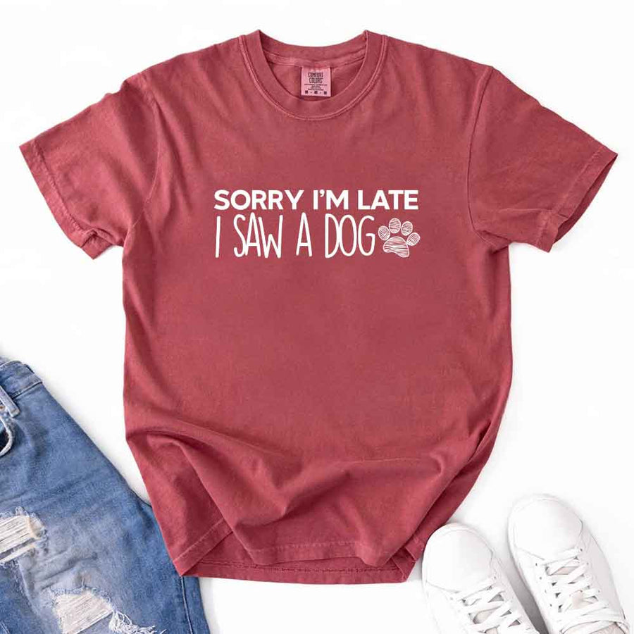 May include a Sorry I'm Late I Saw a Dog Comfort Colors T-Shirt featuring a funny dog lover statement design.