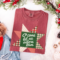 May include an O Come Let Us Adore Him Comfort Colors Christmas T-Shirt featuring a Christian holiday message inspired by a beloved Christmas hymn, designed for church services, family gatherings, worship events, and meaningful seasonal gifting.