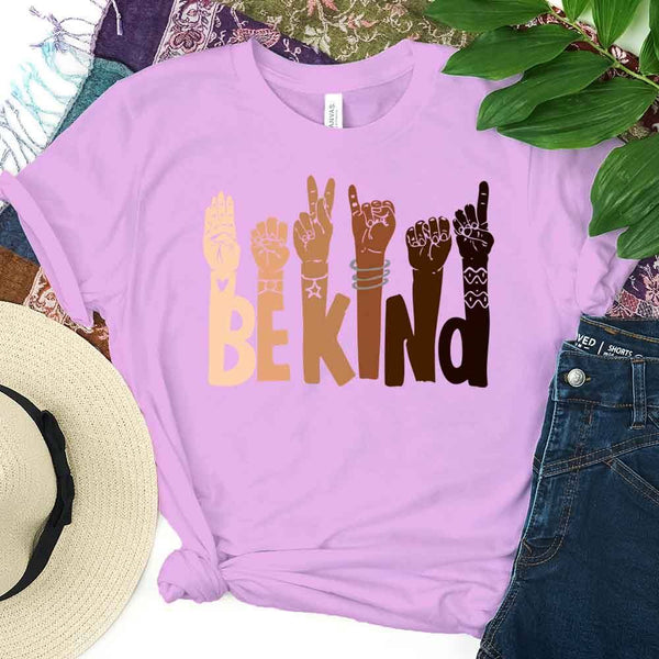 May include a graphic design featuring the phrase “BE KIND,” with each letter creatively formed by illustrated hands making various sign language gestures in different skin tones, symbolizing kindness, inclusion, and diversity.