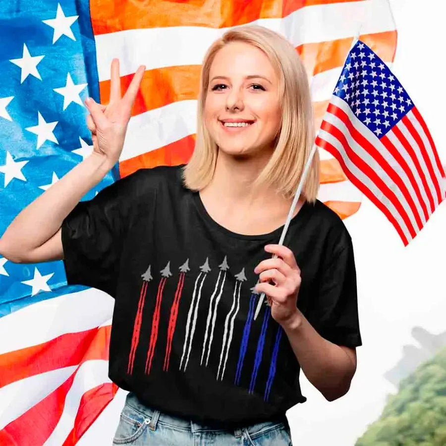 Woman in black patriotic air force flyover t-shirt holding American flag, USA flag backdrop