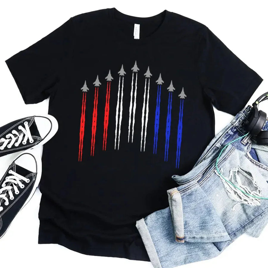 Black t-shirt with gray jet planes and red, white, blue trail design, shown with jeans