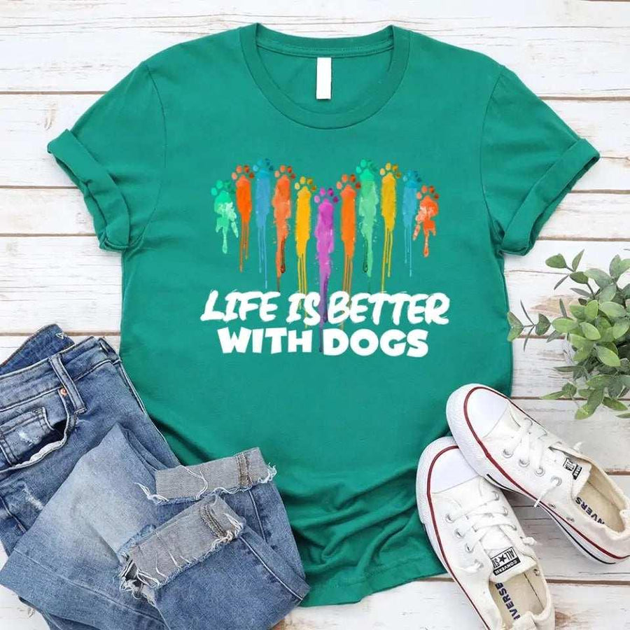 May include a unisex t-shirt featuring the phrase “Life Is Better With Dogs” in clean, friendly lettering, designed to celebrate dog lovers with a simple and relatable message.