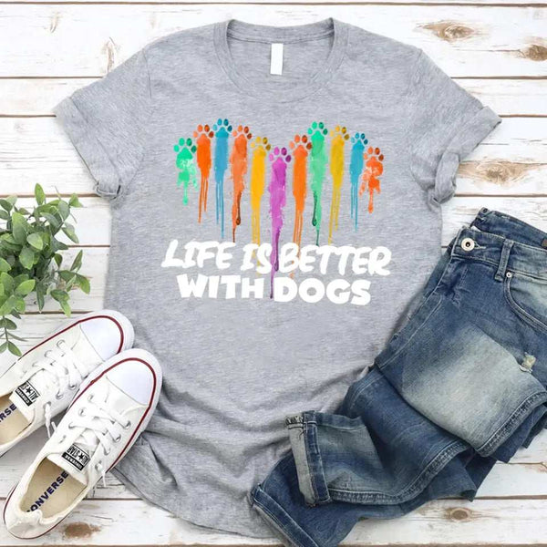 May include a unisex t-shirt featuring the phrase “Life Is Better With Dogs” in clean, friendly lettering, designed to celebrate dog lovers with a simple and relatable message.