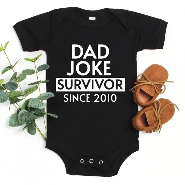 May include a father and family wearing matching t-shirts with a “Dad Jokes” graphic.