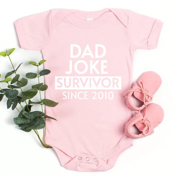 May include a father and family wearing matching t-shirts with a “Dad Jokes” graphic.