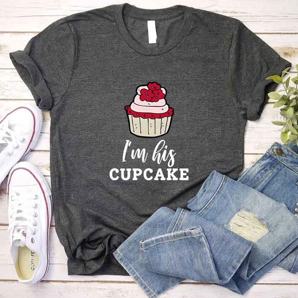 May include a cupcake-themed couple t-shirt with playful graphics symbolizing love and sweetness.