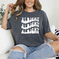 May include Dark Heather group in colorful tie-dye shirts reading “Dazed & Engaged,” smiling at a bachelorette party, with bride in veil and fun, festive vibe!