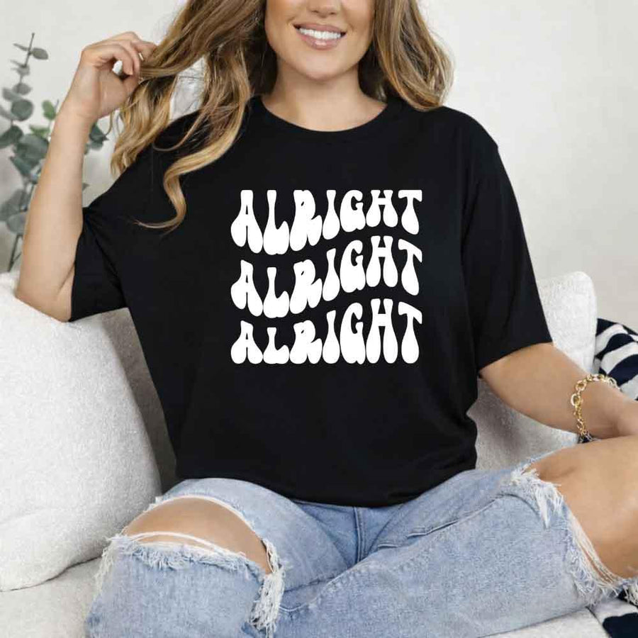 May include Black group in colorful tie-dye shirts reading “Dazed & Engaged,” smiling at a bachelorette party, with bride in veil and fun, festive vibe!