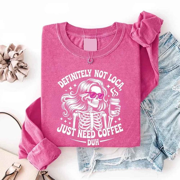 May include a women’s long sleeve shirt with the phrase “Definitely Not Loca” printed on the front in a casual, stylish design.