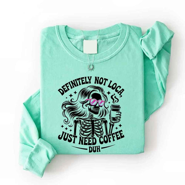 May include a women’s long sleeve shirt with the phrase “Definitely Not Loca” printed on the front in a casual, stylish design.