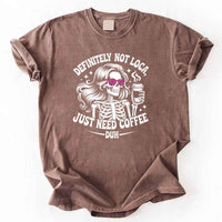 May include a short sleeve graphic tee featuring the phrase “Definitely Not Loca”  on a casual unisex shirt.