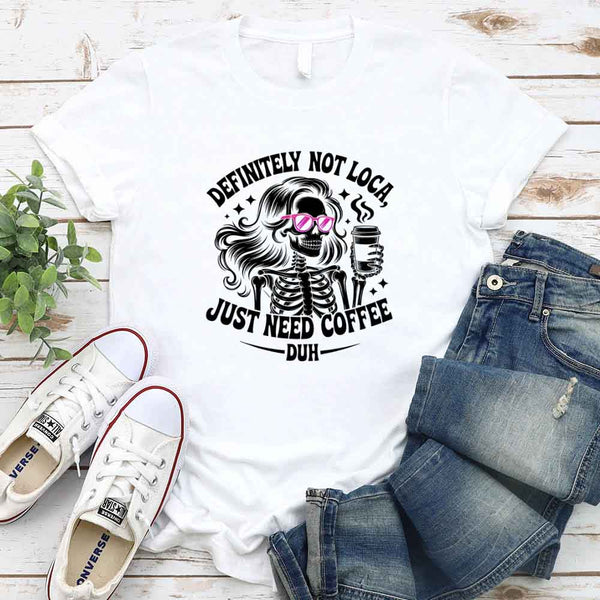 May include a short sleeve graphic tee featuring the phrase “Definitely Not Loca”  on a casual unisex shirt.