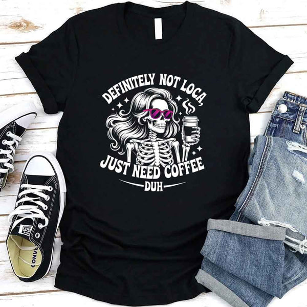 May include a short sleeve graphic tee featuring the phrase “Definitely Not Loca”  on a casual unisex shirt.