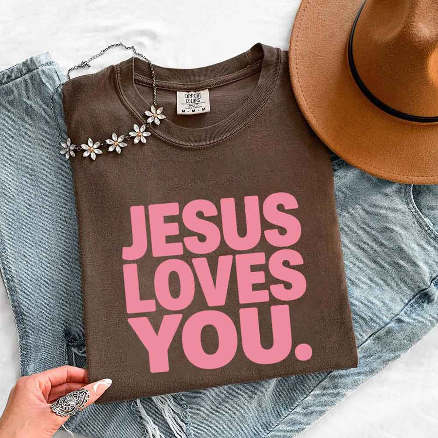 May include Jesus Loves You Comfort Colors short sleeve religious message shirt with relaxed fit graphic design