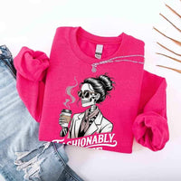 May include a long sleeve shirt featuring the phrase “Fashionably Late” in a stylish, modern font.