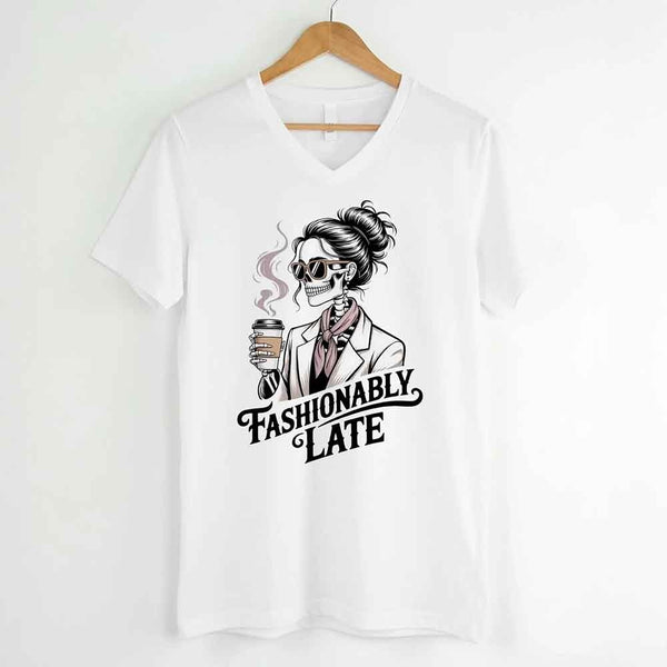 May include a short sleeve shirt featuring the phrase “Fashionably Late” in a stylish, modern font.