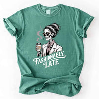 May include a short sleeve shirt featuring the phrase “Fashionably Late” in a stylish, modern font.