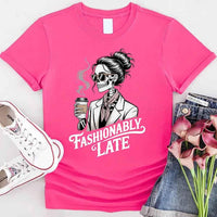 May include a short sleeve shirt featuring the phrase “Fashionably Late” in a stylish, modern font.