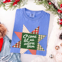 May include an O Come Let Us Adore Him Comfort Colors Christmas T-Shirt featuring a Christian holiday message inspired by a beloved Christmas hymn, designed for church services, family gatherings, worship events, and meaningful seasonal gifting.