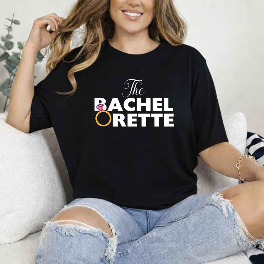 May include Black fun and trendy Bachelorette party t shirt with stylish slogans vibrant colors bridal squad outfit perfect for girls night out celebration!
