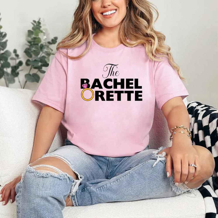 May include Pink fun and trendy Bachelorette party t shirt with stylish slogans vibrant colors bridal squad outfit perfect for girls night out celebration!
