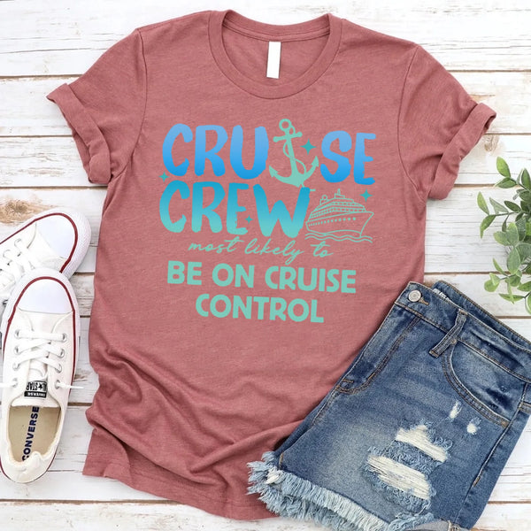 May include a set of “Cruise Crew” t-shirt designs featuring bold blue lettering with an anchor and cruise ship graphic, each shirt paired with a humorous phrase such as “meet a mermaid,” “fall asleep first,” “complain about the matching shirts,” “be on cruise control,” or “disappear.”