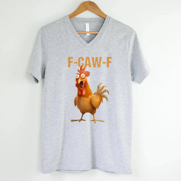May include a unisex V-neck t-shirt featuring a humorous chicken graphic with the phrase ‘F-Caw-F,’ styled for coffee lovers and farm humor fans.