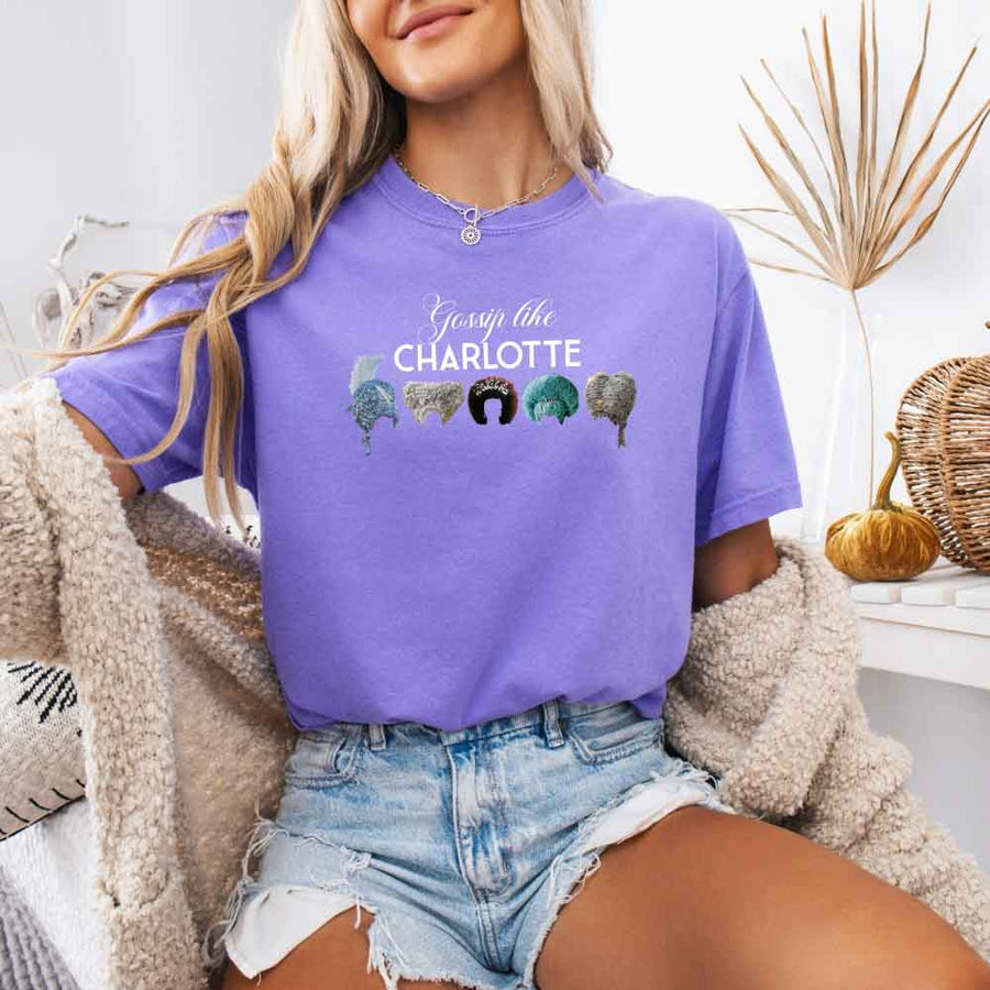 May include a person wearing a Violet Gossip Like Charlotte Wigs Comfort Colors T-Shirt featuring historical drama inspired graphic and relaxed fit.