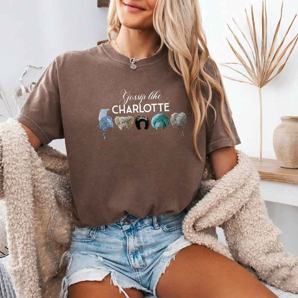 May include a person wearing a Espresso Gossip Like Charlotte Wigs Comfort Colors T-Shirt featuring historical drama inspired graphic and relaxed fit.