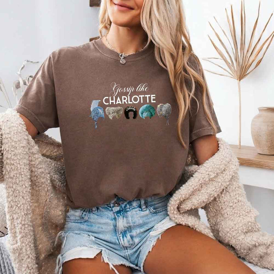 May include a person wearing a Espresso Gossip Like Charlotte Wigs Comfort Colors T-Shirt featuring historical drama inspired graphic and relaxed fit.