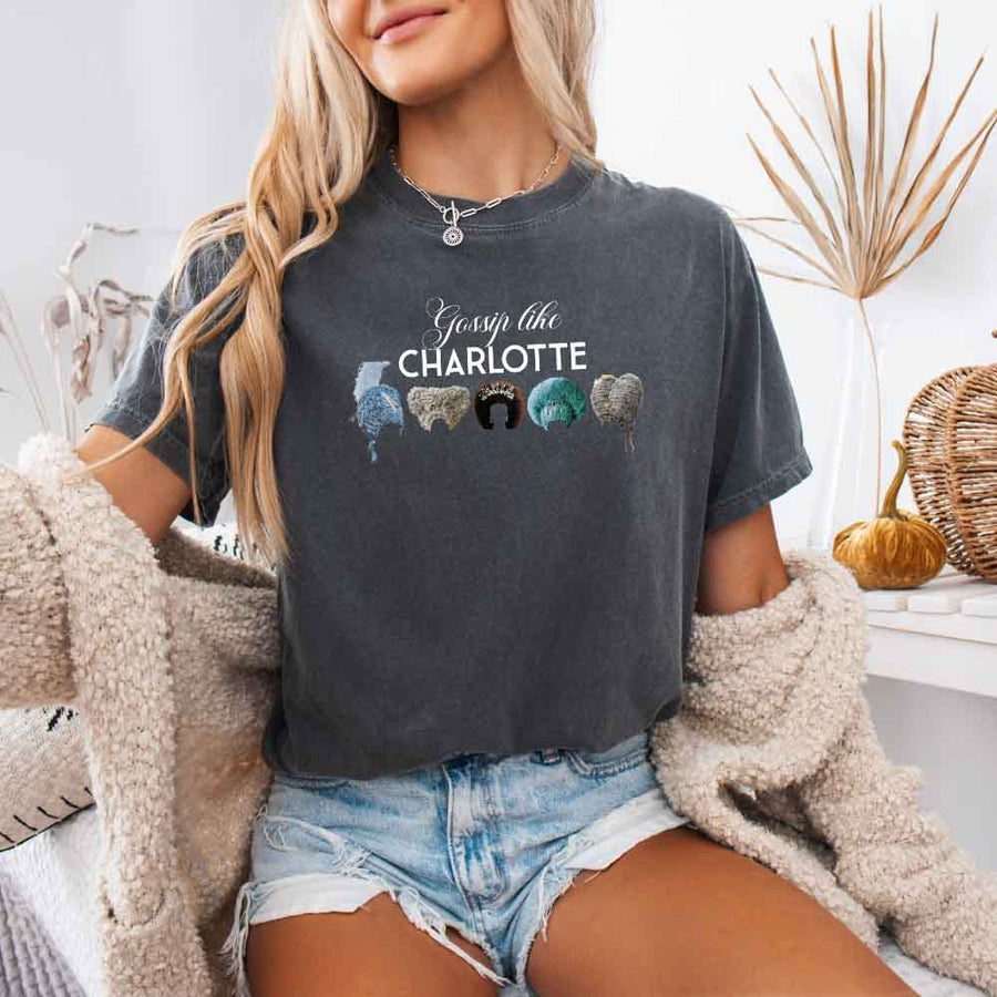 May include a person wearing a Pepper Gossip Like Charlotte Wigs Comfort Colors T-Shirt featuring historical drama inspired graphic and relaxed fit.