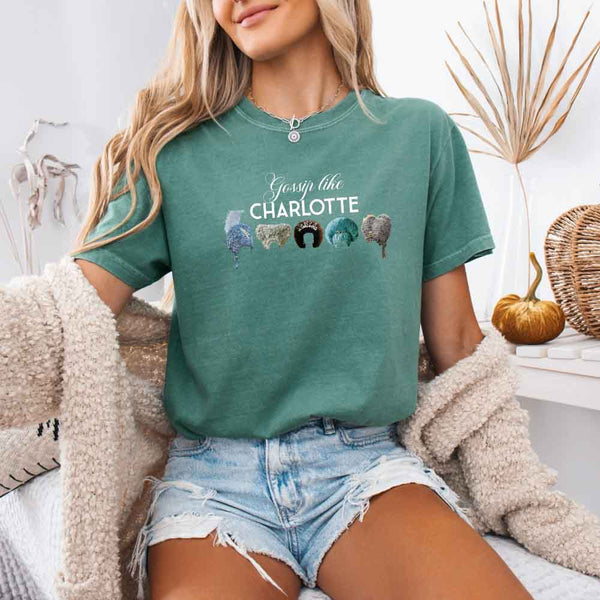 May include a person wearing a Light Green Gossip Like Charlotte Wigs Comfort Colors T-Shirt featuring historical drama inspired graphic and relaxed fit.