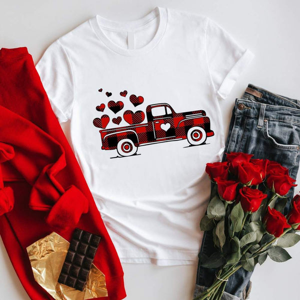 May include a graphic t-shirt featuring a vintage truck with a heart and buffalo plaid accents.