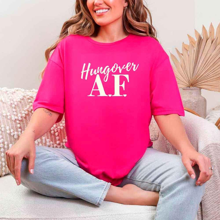 May include Heliconia a fun, bold design for a bachelorette party T-shirt with a playful "Hungover AF" slogan! Perfect for partygoers looking to make a statement!
