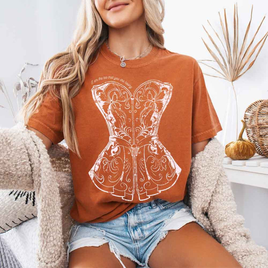 May include a person wearing a Yam I Am The Tea That You Are Having Comfort Colors T-Shirt featuring royal court inspired graphic and relaxed fit.