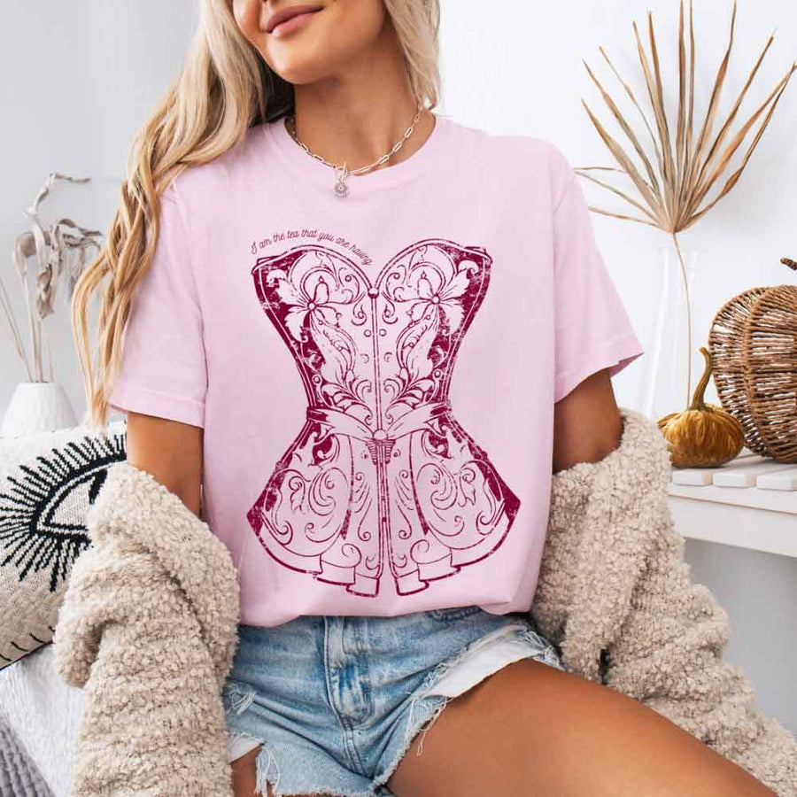 May include a person wearing a Blossom I Am The Tea That You Are Having Comfort Colors T-Shirt featuring royal court inspired graphic and relaxed fit.