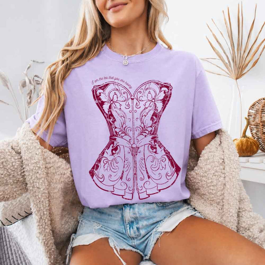 May include a person wearing an Orchid I Am The Tea That You Are Having Comfort Colors T-Shirt featuring royal court inspired graphic and relaxed fit.