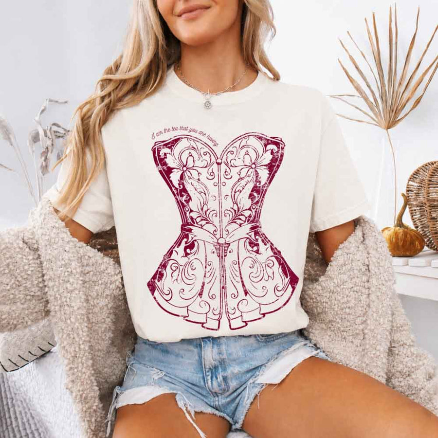 May include a person wearing a Ivory I Am The Tea That You Are Having Comfort Colors T-Shirt featuring royal court inspired graphic and relaxed fit.
