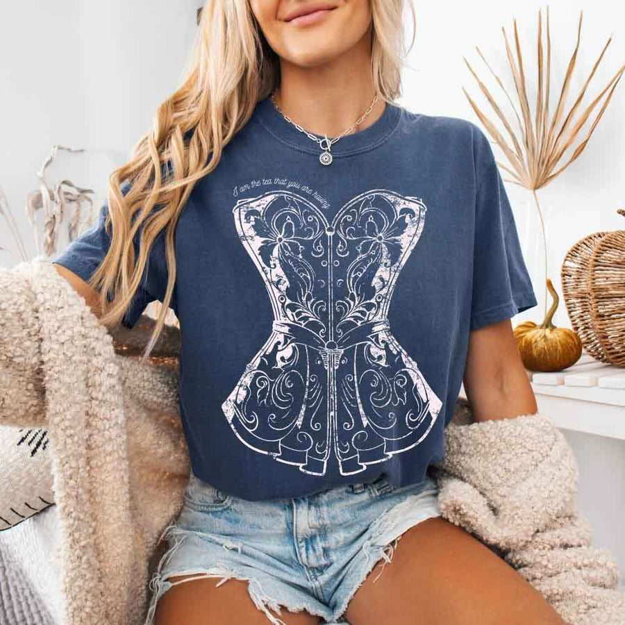 May include a person wearing a Denim I Am The Tea That You Are Having Comfort Colors T-Shirt featuring royal court inspired graphic and relaxed fit.