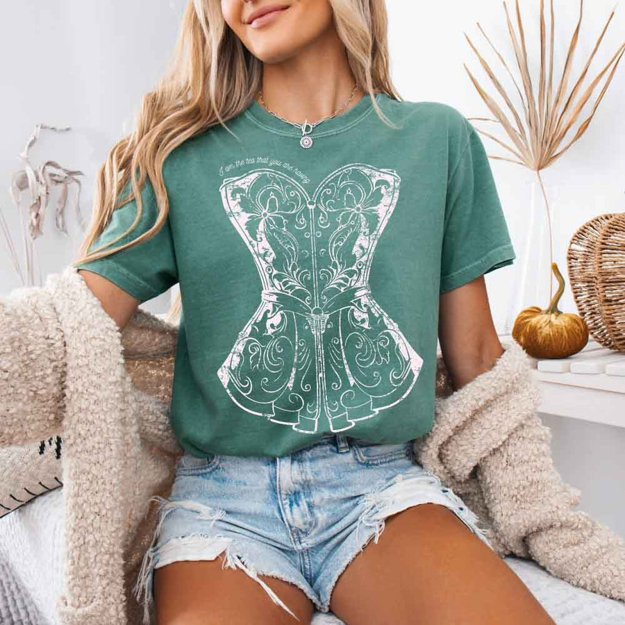 May include a person wearing a Light Green I Am The Tea That You Are Having Comfort Colors T-Shirt featuring royal court inspired graphic and relaxed fit.