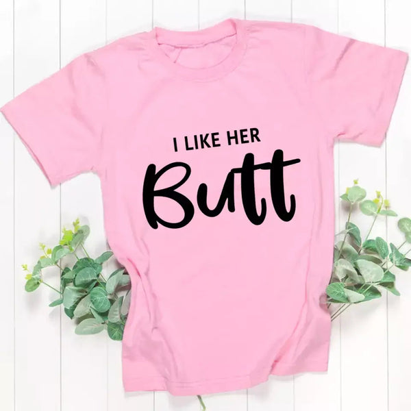 May include a pair of unisex couple t-shirts reading “I Like His Beard” and “I Like Her Butt,” displayed side by side in black and white cotton.