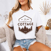 May include a person wearing a White I’m Coming to the Cottage T-Shirt featuring rivalry inspired graphic design and relaxed fit.