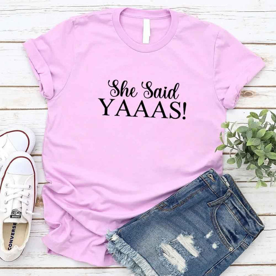 May include Lilac I Said YAAAS Bachelorette Crew Party Matching T-Shirts, featuring "I Said YAAAS" and "Bride" graphics, made from soft cotton for comfort and perfect for group photos at bachelorette parties.