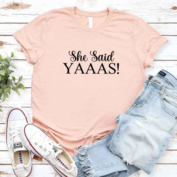 May include Peach I Said YAAAS Bachelorette Crew Party Matching T-Shirts, featuring "I Said YAAAS" and "Bride" graphics, made from soft cotton for comfort and perfect for group photos at bachelorette parties.