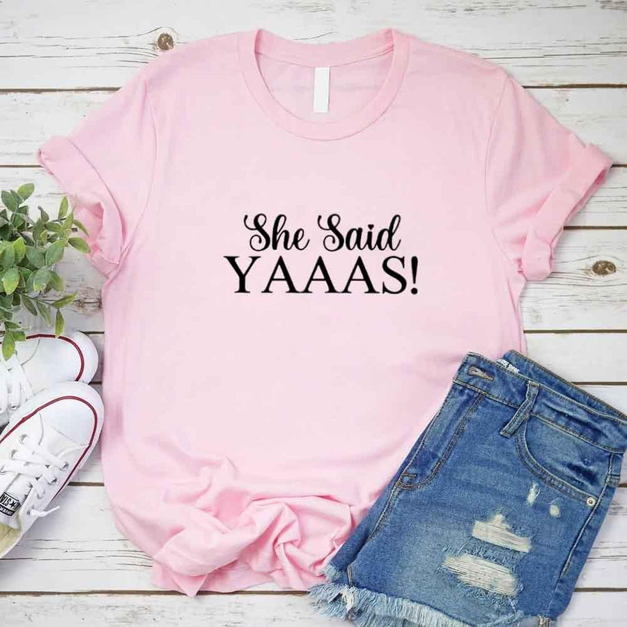 May include Pink I Said YAAAS Bachelorette Crew Party Matching T-Shirts, featuring "I Said YAAAS" and "Bride" graphics, made from soft cotton for comfort and perfect for group photos at bachelorette parties.