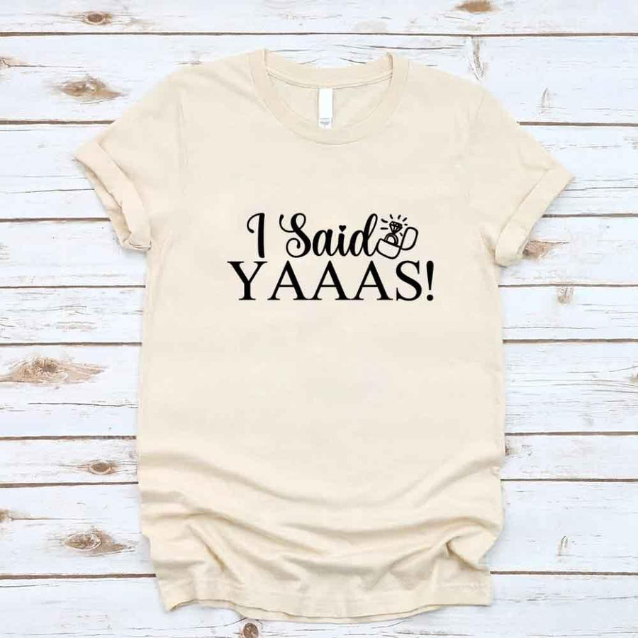 May include Cream I Said YAAAS Bachelorette Crew Party Matching T-Shirts, featuring "I Said YAAAS" and "Bride" graphics, made from soft cotton for comfort and perfect for group photos at bachelorette parties.